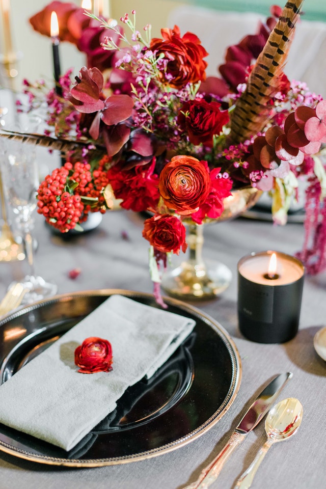 Event centerpiece in burgundy colour