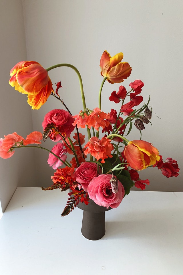 Modern Corporate flower arrangement of red flowers