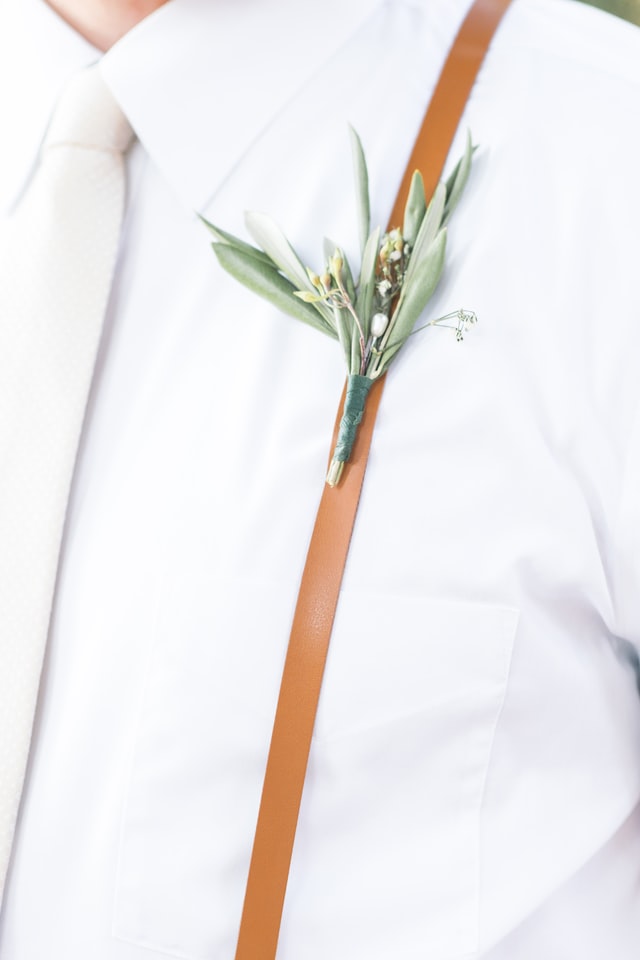 Minimalistic boutonniere on a groom's shirt